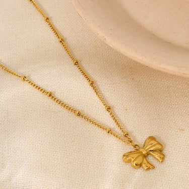 18k-ribbon-bow-knot-pendant-necklace-and-earrings-set